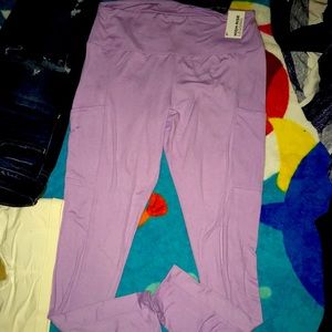 Rue 21 light purple leggings with pockets size LG
